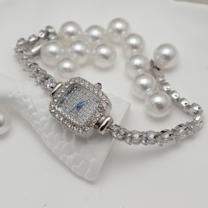 Reloj de pulsera de lujo con diamantes para <span class=keywords><strong>mujer</strong></span>, venta al por mayor, regalo para niñas, precio de fábrica, reloj de cuarzo personalizado OEM - Product Image 5