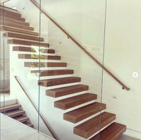 Escalier flottant moderne à marches ouvertes avec marches en bois, escalier cantilever sur mesure pour l'intérieur