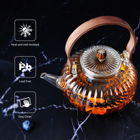 Théière en verre borosilicate résistant à la chaleur avec poignée en bois, design créatif en forme de citrouille, compatible avec les cuisinières à gaz