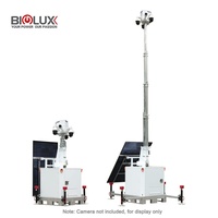 Tour de vidéosurveillance solaire 450W avec base sur chenilles, chargeur CA, boîtier CCTV hexagonal et mât télescopique pour la sécurité des chantiers