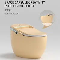 WC intelligent en céramique monobloc à poser au sol avec double chasse, siège chauffant et séchage à l'air pour usage hôtelier