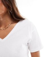 100% coton col en V femmes blanc t-shirt étiquette personnalisée Sexy dames pré-rétréci été doux T-shirt
