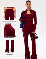 Pantalon large taille haute en nylon et élasthanne avec empiècements latéraux contrastants, idéal pour le sport et le style décontracté automne-hiver