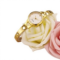 Montre à quartz pour femmes en acier inoxydable doré de luxe, marque tendance, neuve, résistante à l'eau, best-seller