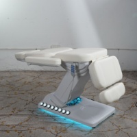 Table de massage électrique au design classique moderne, lit de beauté pour salon, lit facial pour traitement des cils, lit d'esthéticienne, base blanche