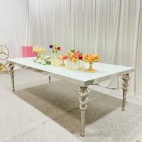 Table rectangulaire moderne en acier inoxydable argenté avec plateau en verre pour mariage