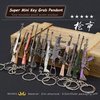 Vente en gros d'armes chaudes Vendre une gamme complète d'armes à feu Modèles d'armes Artisanat en métal Porte-clés Pendentifs Jouets pour enfants