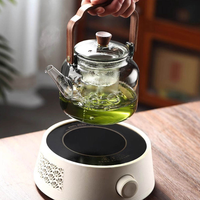 Théière moderne en verre borosilicate avec poignée en bois, compatible cuisinière, 1100 ml, transparente, gris fumé, avec infuseur amovible pour thé et fruits