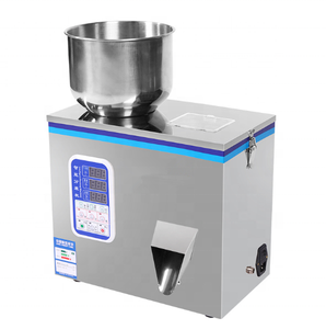 Machine de pesage et de remplissage automatique de petits sachets de sucre, café, thé, granulés et poudres pour l'emballage - Product Image 1