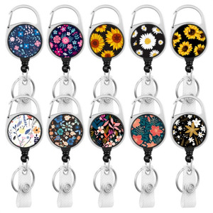 Wholesale stock of flower and leaf crystal mountaineering easy-pull <b>buckles</b>, zinc alloy retractable chrysanthemum easy-pull - Product Image 1