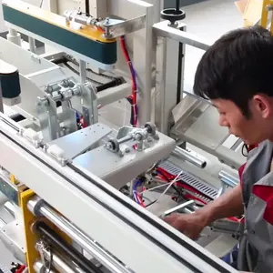 GURKI scatola di cartone di imballaggio del nastro sigillante macchina automatica per cartone sigillante con piegatura e reggiatura - Product Image 3