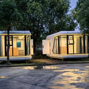 Maison modulaire portable en forme de capsule spatiale avec panneaux solaires, 2 pièces, cuisine et salle de bain - Product Image 2