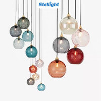 Lustre LED suspendu au design nordique simple et créatif, motif aquatique, avec des luminaires en verre teinté pour salle à manger et salon