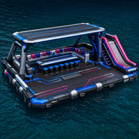 Île flottante gonflable personnalisable pour parc aquatique avec toboggan, auvent, canapé, bar et table pour la location en milieu hôtelier