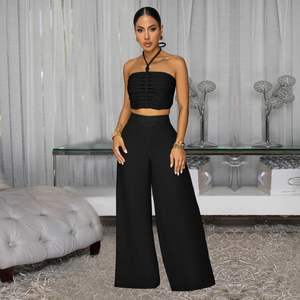 ชุดเซ็ต 2 ชิ้นสำหรับผู้หญิง รุ่นคัสตอม 2026 เสื้อแขนกุดแบบผูกคอและกางเกงขายาวทรงตรง ผ้าเนื้อยืด ระบายอากาศดี แต่งเชือกผูก เหมาะสำหรับงานปาร์ตี้ - Product Image 1