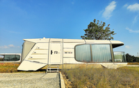CGCH Conteneur de luxe en aluminium préfabriqué chinois Espace mobile Capsule Cabine étanche Commercial Maison Villa Appartement Boutique
