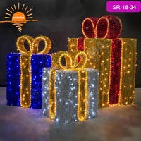 Boîte-cadeau interactive à LED avec motif lumineux pour la décoration de Noël en extérieur, les événements commerciaux et les projets de spectacle lumineux personnalisés pour les fêtes.