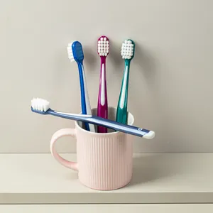 Kualitas tinggi Oem Odm kustom sikat gigi berbulu lembut pijat gusi gigi pemutih sikat gigi dewasa sedang
