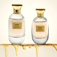 Flacon de parfum rond transparent de luxe de haute qualité 100 ml avec bouchon à vis personnalisé en verre rechargeable avec étiquette