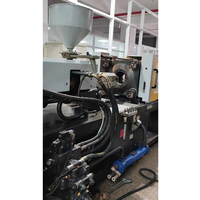La machine de moulage par injection en plastique haïtienne 150 T a utilisé la machine de moulage par injection à vendre