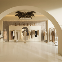 Présentoir en bois personnalisé de luxe léger pour vêtements pour femmes Mobilier de magasin suspendu avec étagères à panneaux de luxe