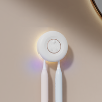 Dinding Mini pintar UVC pemegang sterilisasi sikat gigi peralatan pensteril UV dengan jam & fungsi lampu malam fitur panas portabel