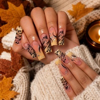 Faux ongles tendance inspirés de Maillard, motifs léopard automne/hiver, strass, fils argentés, matériau ABS