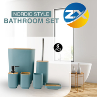 Ensemble d'accessoires de salle de bain noir mat de luxe avec organisateur en bambou et plastique, collection en résine pour une décoration intérieure épurée