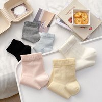 Chaussettes pour femmes en coton doux et confortable de couleur unie, vente en gros d'usine