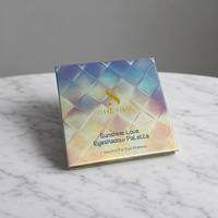 Palette de fards à paupières personnalisable 9 couleurs avec miroir, emballage en carton magnétique à charnière au design holographique scintillant