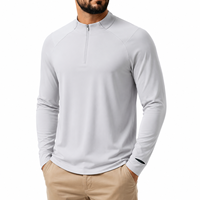 Haut de sport athlétique pour homme à manches longues, col montant zippé, design OEM, coupe ajustée, doux, respirant, séchage rapide, pour entraînement en salle de sport