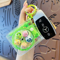 Vente en gros de porte-clés amusants en plastique en forme de requin gourmand, machine à pêche, tableau de peinture et de dessin pour enfants, cadeaux à suspendre