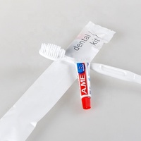 Brosse à dents jetable bon marché pour hôtel avec dentifrice 3g intégré, manche en PP, pour voyage