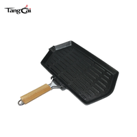 Plaque de cuisson en fonte personnalisée OEM/ODM avec poignée en bois pliable, idéale pour les restaurants et la restauration collective (approvisionnement en gros)
