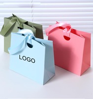 Sacs d'emballage carrés personnalisés de luxe faits à la main pour bijoux, sacs créatifs orange avec poignées pour l'emballage de montres