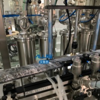 Machine de remplissage automatique de haute précision pour liquides, lotions et pâtes en bouteilles plastiques et en verre (99,5 % de pureté) - Vente en gros