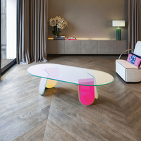 Vente directe d'usine Table basse en acrylique de luxe éblouissante Table basse en acrylique de forme elliptique Design moderne Table d'appoint en acrylique pour salon