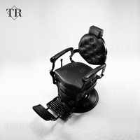 Chaise de barbier professionnelle Turri Minimalist Black High Class, style vintage, pour hommes, en métal, usage commercial.