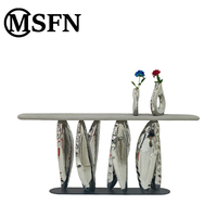 Table console sculpturale moderne, finition peinture artistique texturée, base en acier inoxydable, pieds ondulés, design durable, meubles pour la maison, hôtel