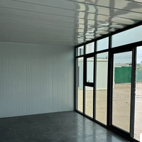 Maison préfabriquée modulaire de couleur personnalisée, bureau mobile en verre à ossature rouge avec fenêtres à battants pour espace de travail commercial