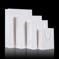 Top vente Sac en papier cadeau personnalisé pour bijoux montres Sacs d'emballage blancs Sacs d'emballage noirs pour lunettes avec impression de logo