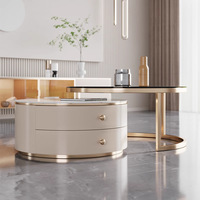 Table basse relevable moderne en pierre frittée avec rangement dissimulé, beige crème, structure métallique minimaliste, mobilier de salon