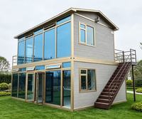 Villa modulaire de luxe à deux étages, préfabriquée, idéale pour complexe hôtelier, gîte panoramique, bureau ou grande villa en verre à deux étages.