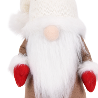 Bonnet en tricot crème, poupée gnome de Noël en peluche assise avec bottes en feutre rouge et bordure en fourrure pour la décoration d'étagère de chambre d'enfant