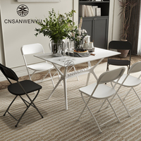 Chaise pliante portable en plastique blanc et noir pour événements extérieurs, idéale pour mariages et réceptions – Vente en gros directe usine