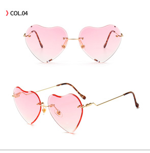 <span class=keywords><strong>Occhiali</strong></span> <span class=keywords><strong>da</strong></span> <span class=keywords><strong>sole</strong></span> <span class=keywords><strong>donna</strong></span> alla moda senza montatura cuore blu rosso giallo viola con montature leggere - Product Image 2