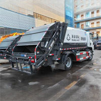 Camion à ordures compacté à énergie nouvelle, alimenté par batterie, SHACMAN 4*2, fabriqué en Chine.