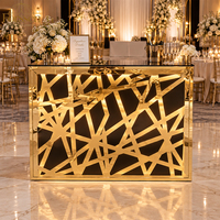 Table de présentation de gâteaux de mariage avec comptoir éclairé par LED et surface noire brillante pour la décoration de la station de desserts des banquets d'hôtel