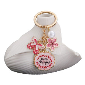 <span class=keywords><strong>Mejor</strong></span> Día DE LA MADRE Regalo de cumpleaños único Pink Mom Llavero Pearl Heart Butterfly Flower Charms Car Bag Backbag Keyring Made Metal - Product Image 1