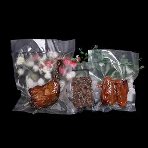 Çin tedarikçisi özel dokulu kabartmalı şeffaf gıda tasarrufu vakum mühür paketi çantası biyobozunur vakum poşeti